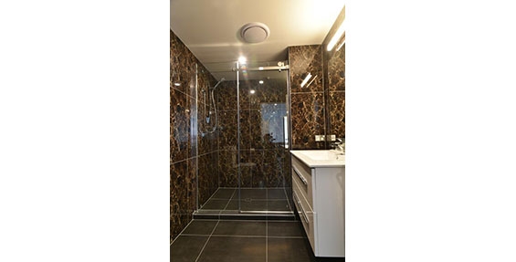 luxury fully tiled bathroom of one-bedroom suite